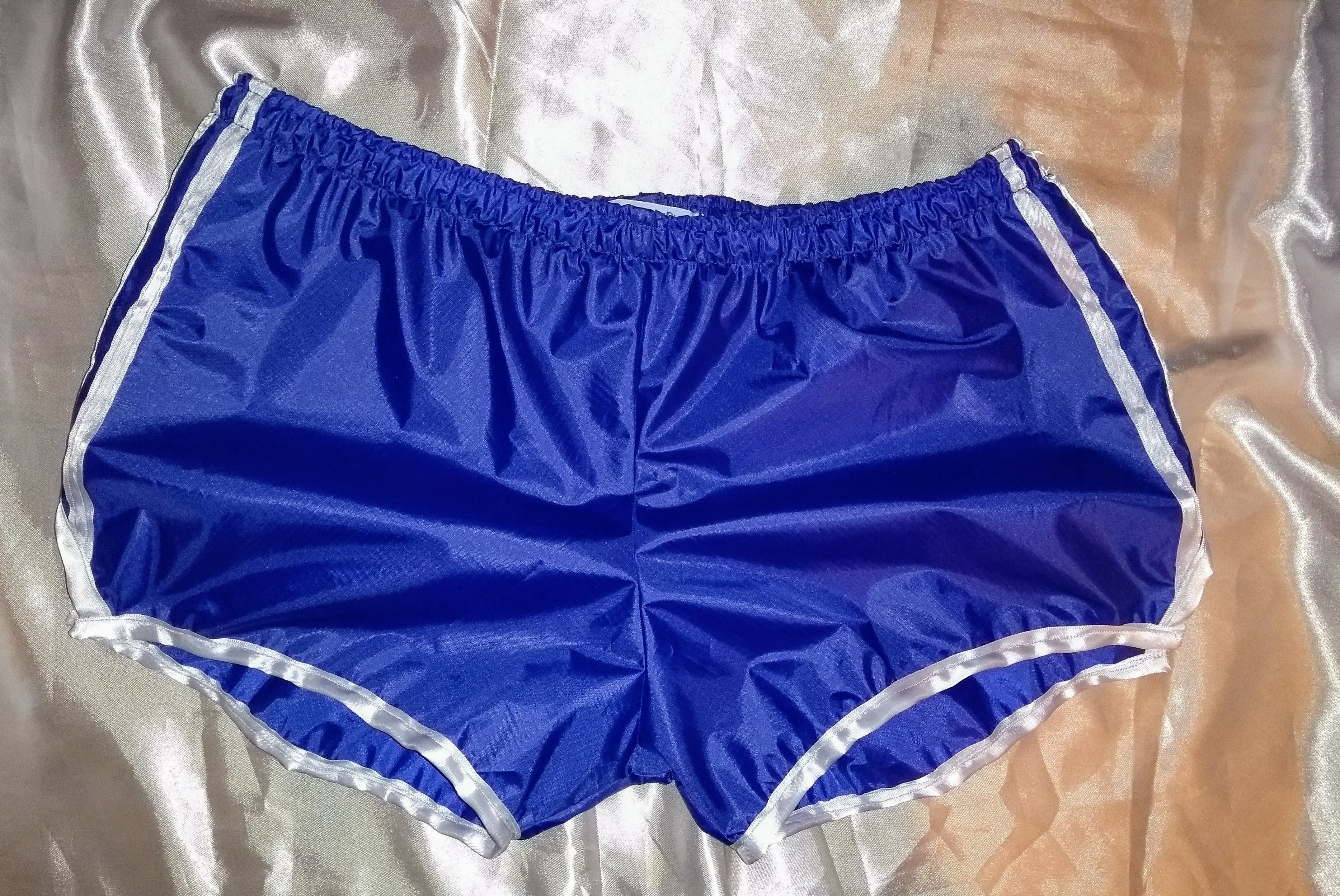Royal blue ripstop nylon footy shorts with white trim (L)